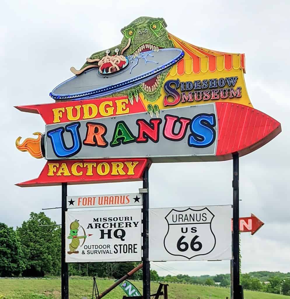 Colorful sign for Uranus Fudge Factory in St. Robert, Missouri.
