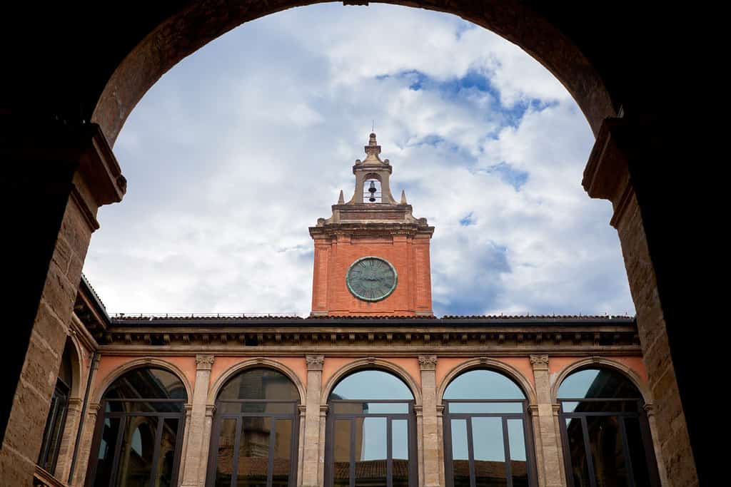 tower and courtyard of Archiginnasio palace - the first official headquarters for the University of Bologna