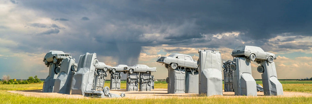 ALLIANCE, NE, USA - July 9, 2017: Carhenge panorama - famous car sculpture created by Jim Reinders, a modern replica of England's Stonehenge using old cars.
