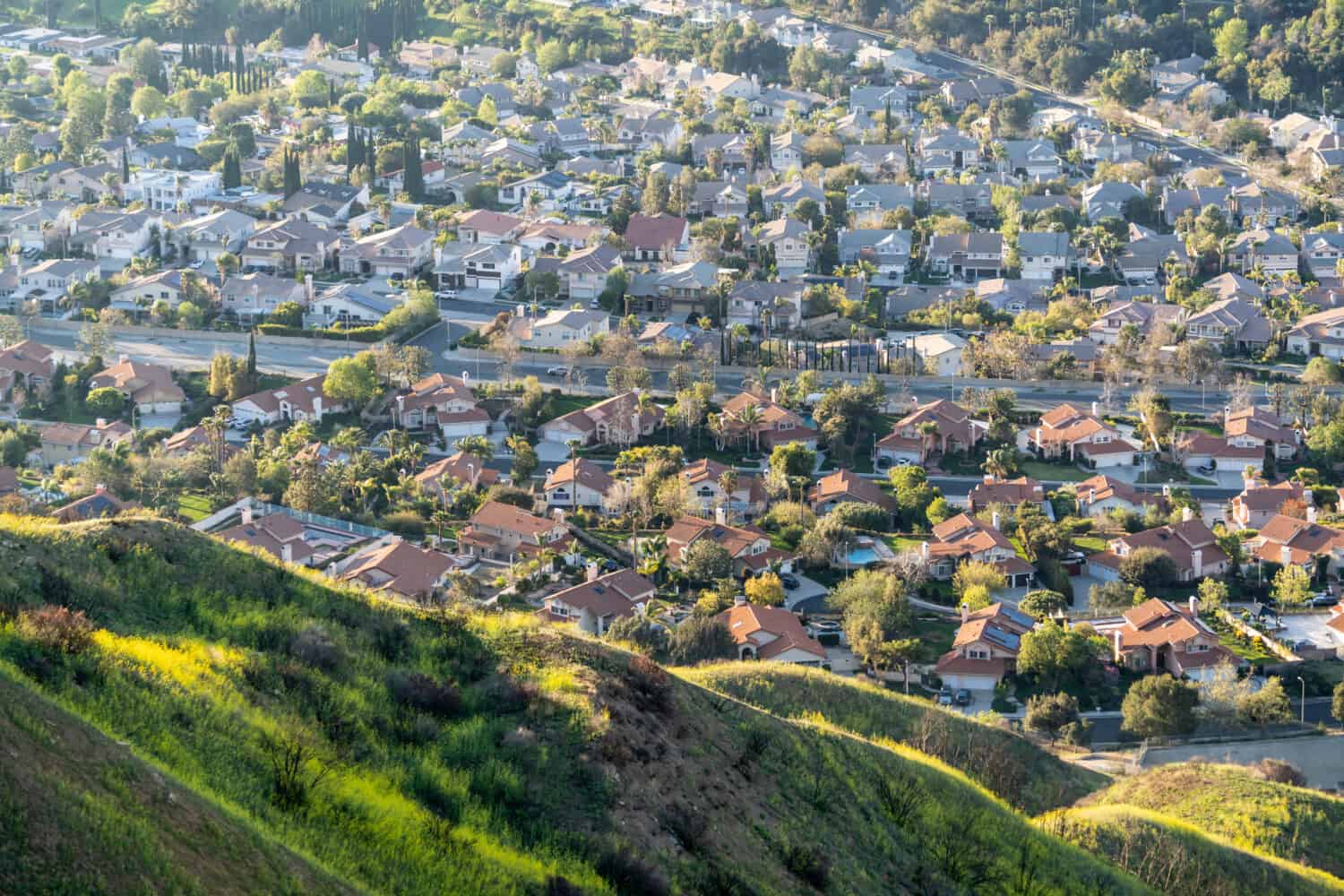 Mountain slopes and valley homes in the Granada Hills area of north Los Angeles, California.