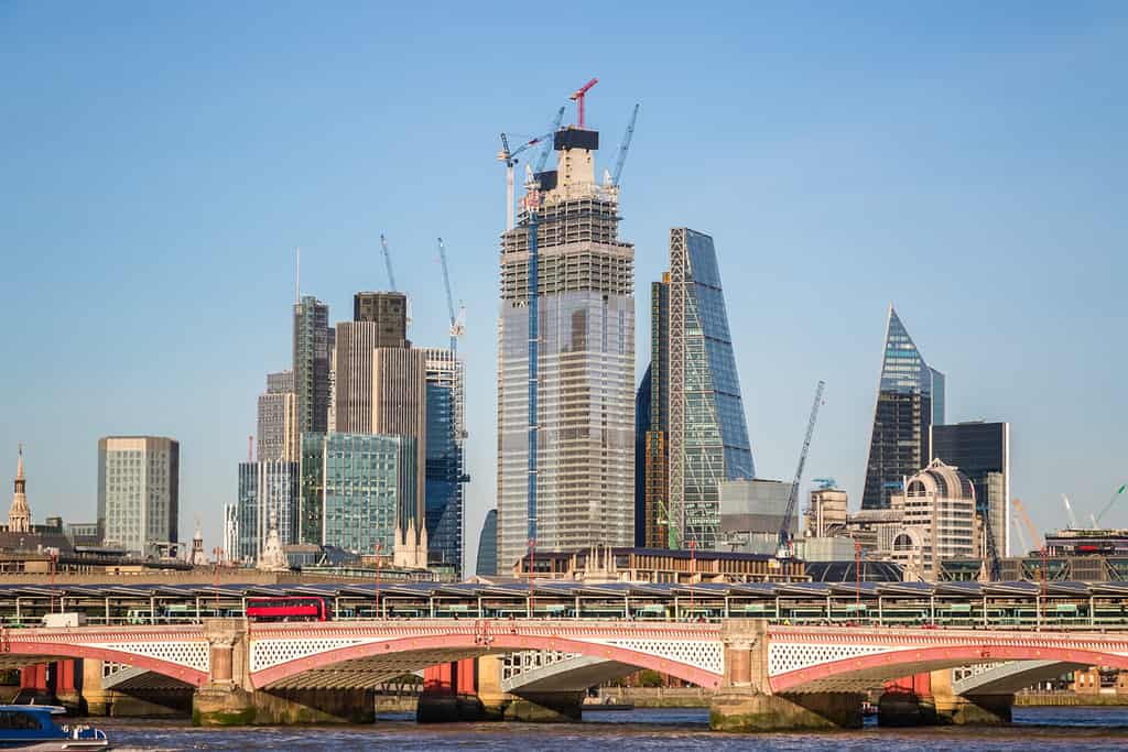 London cityscape with Blackfriars traffic and railway bridges on a cloudless day