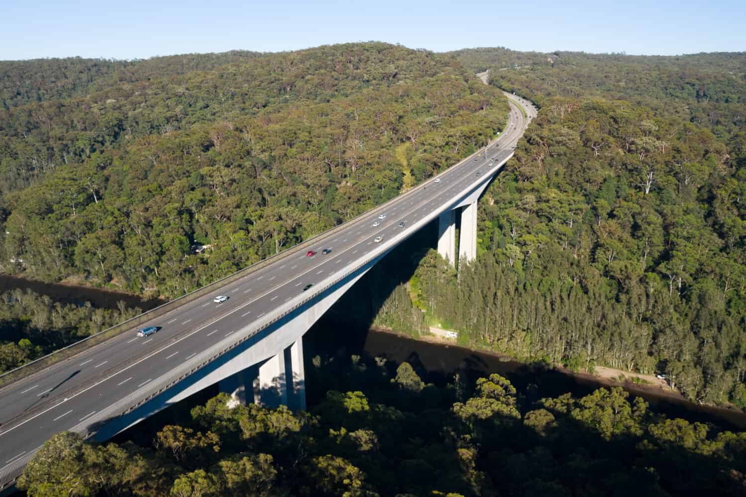 Aerial view of the Pacific Motorway (M1) and the 74m high twin cantilever Mooney Mooney Creek Bridge.