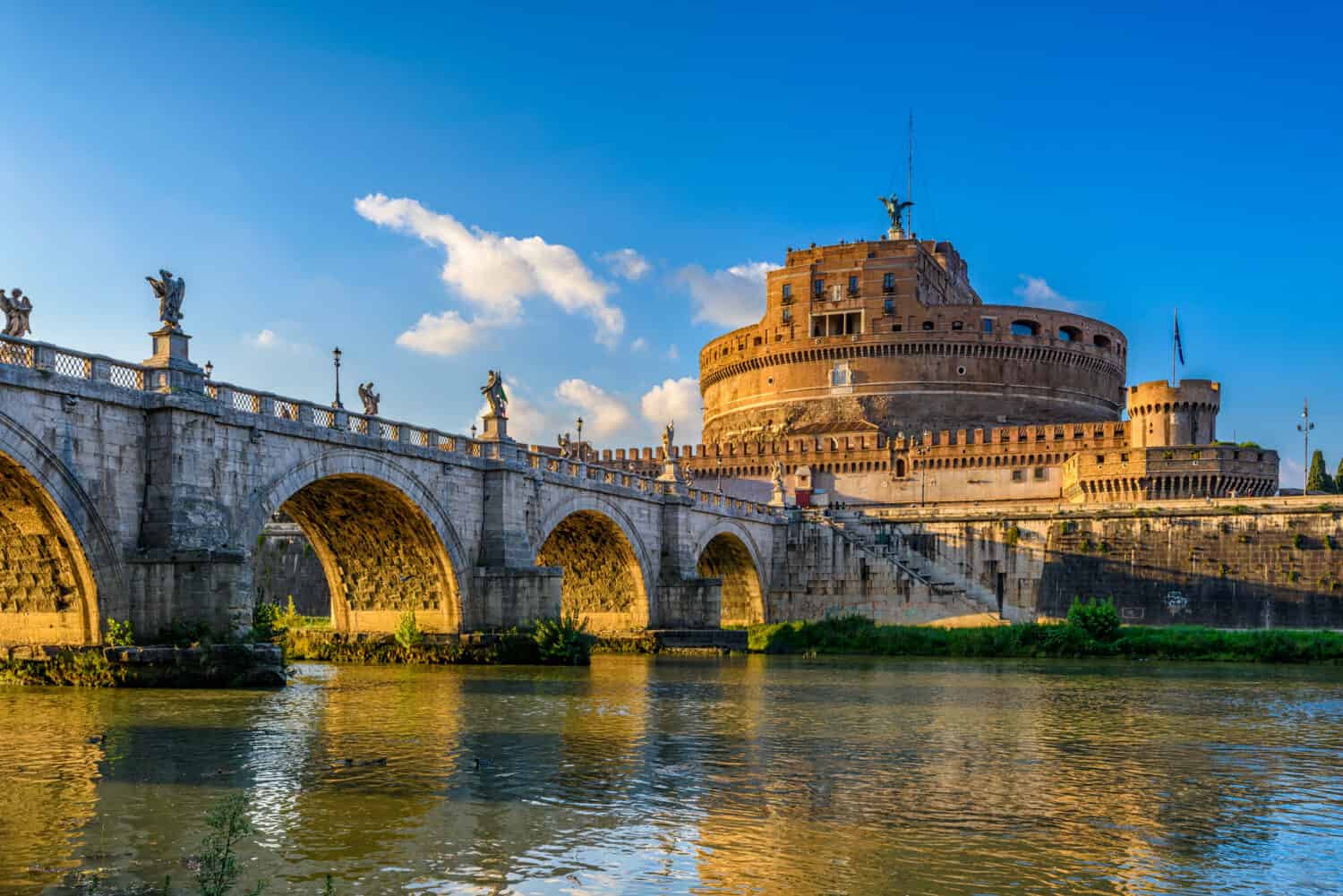 Castle Sant Angelo (Mausoleum of Hadrian), bridge Sant Angelo and river Tiber in Roma, Italy. Architecture and landmark of Rome. Cityscape of Rome.