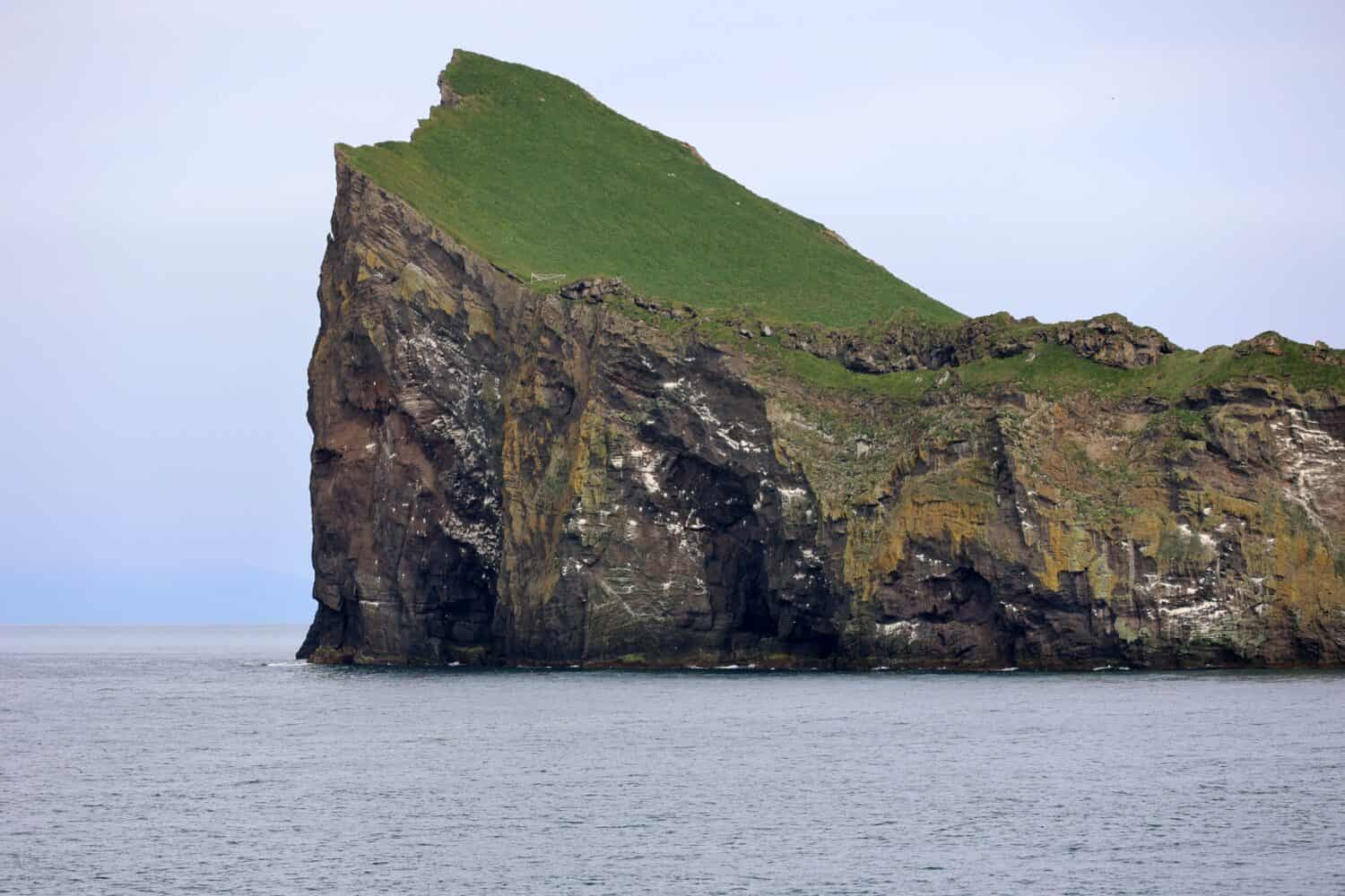The Icelandic island of Ellidaey in the Vestmannaeyjar archipelago   