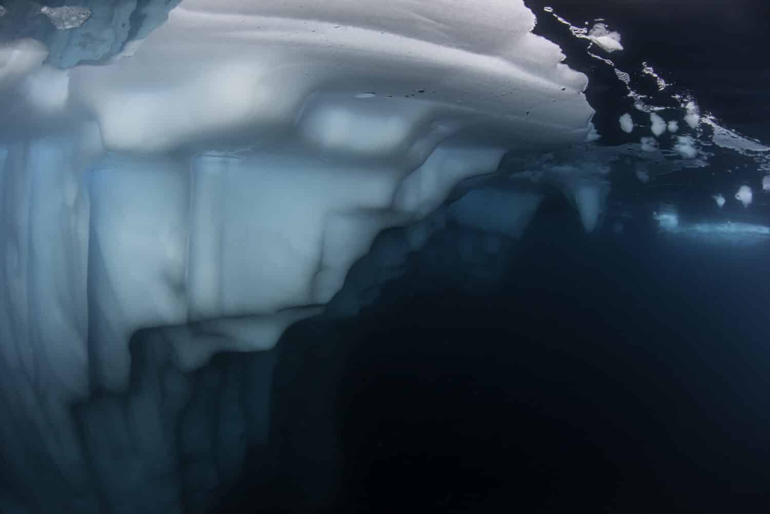Underwater view of an iceberg along the east coast of Greenland.