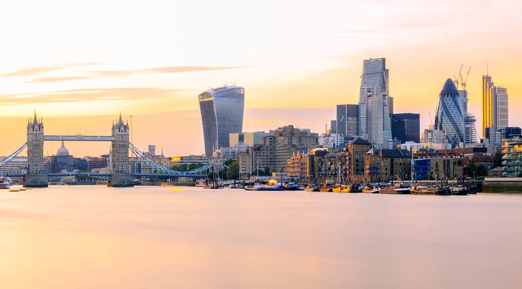Long exposure, panoramic view of London cityscape at sunset with landmarks