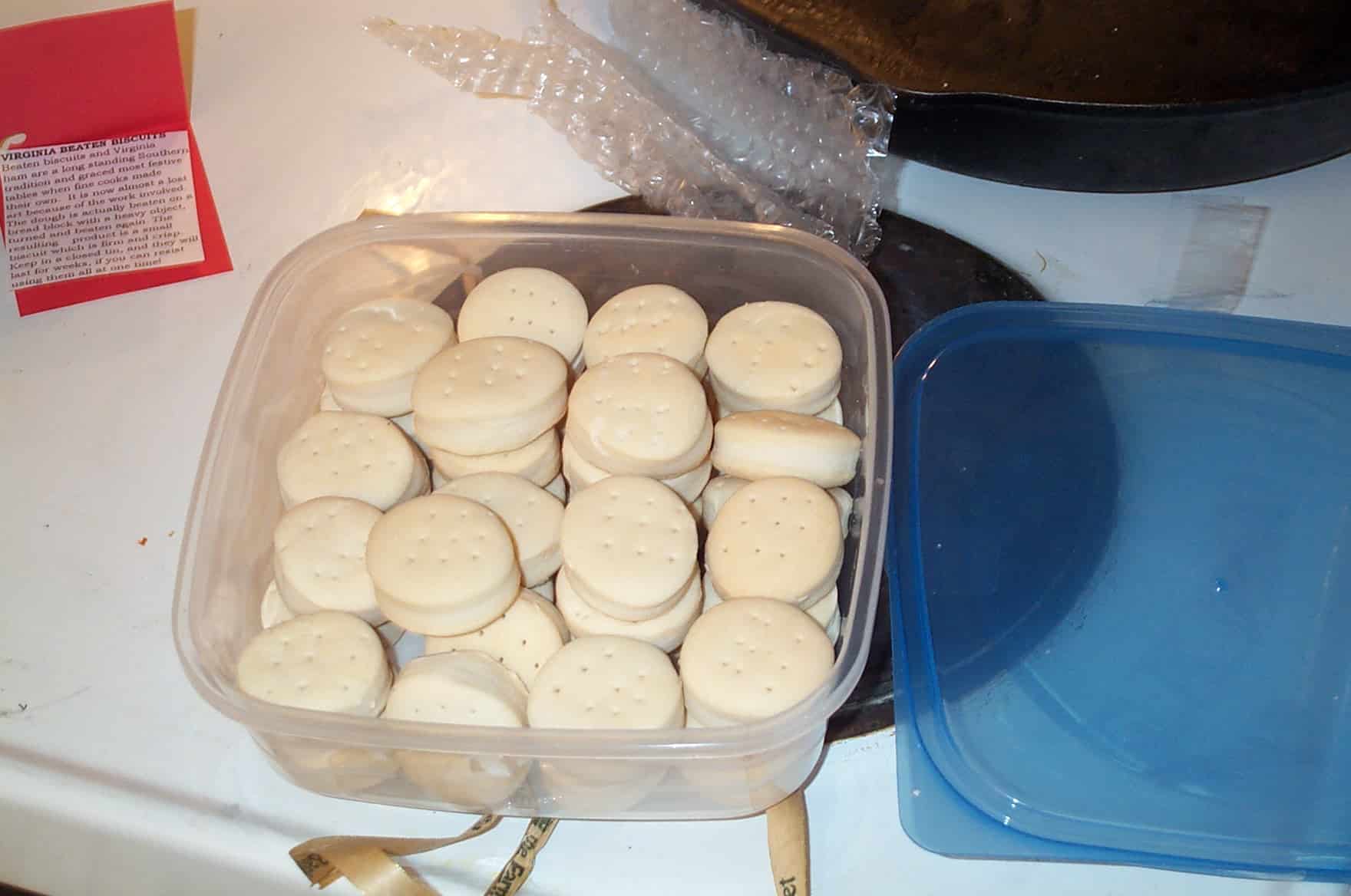 Beaten biscuits in a plastic container.