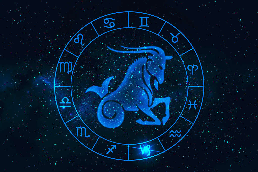 capricorn horoscope sign in twelve zodiac with galaxy stars backgroun