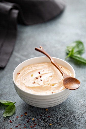 Homemade creamy chili dipping sauce or salad dressing