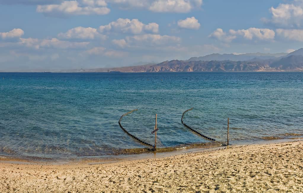 Entrance into swimming area on sandy beach of the Red Sea