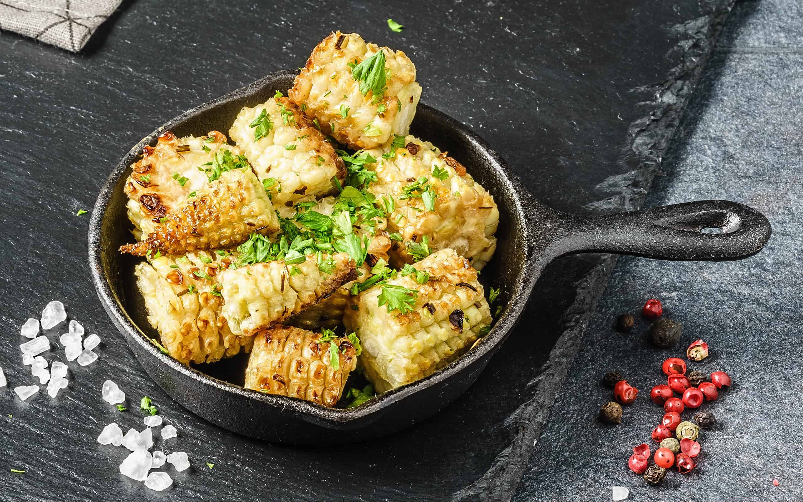 Small roasted corn on the cob