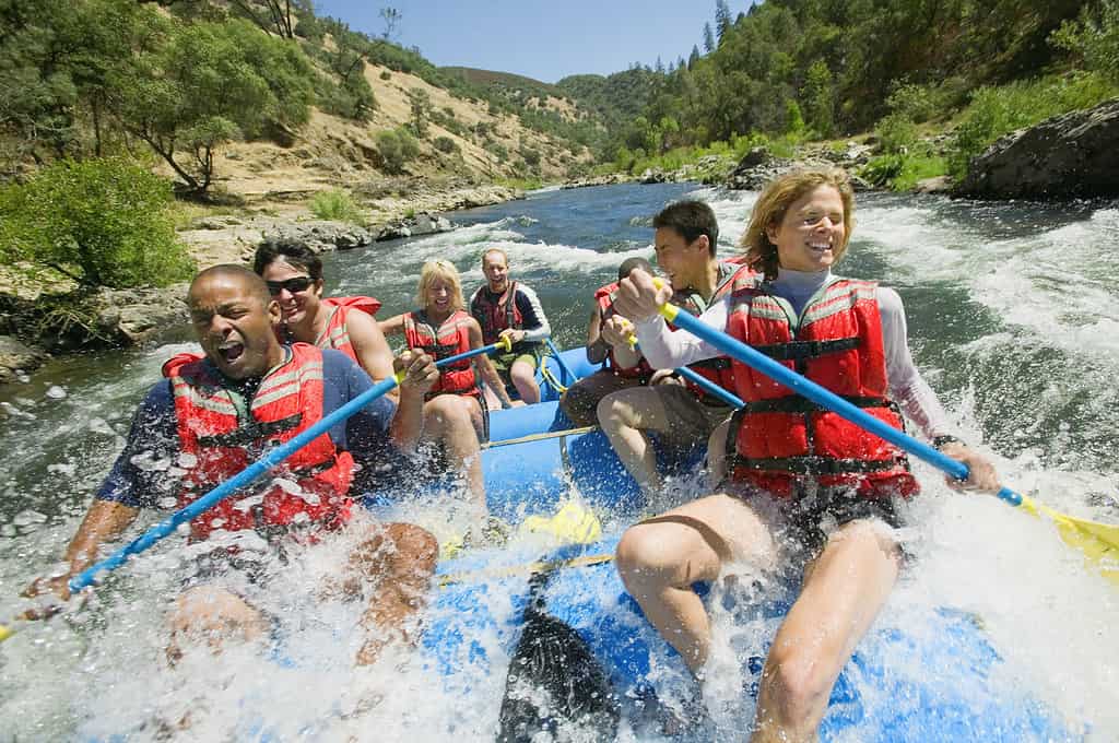 People whitewater rafting