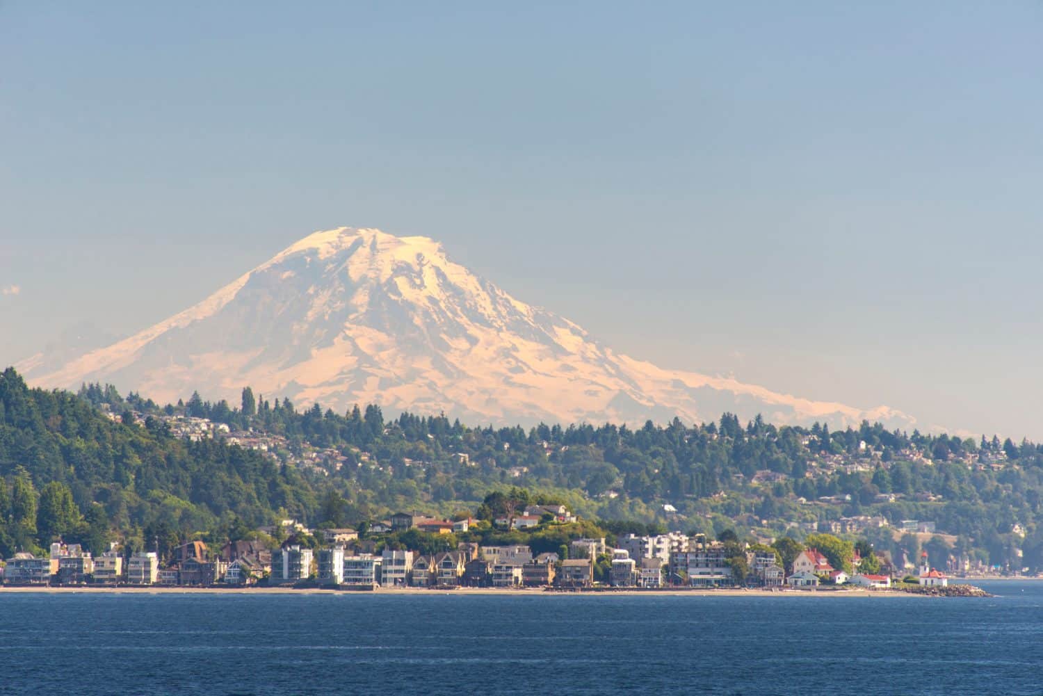 USA, Washington State, Seattle. View of Mount Rainier beyond West Seattle and Alki Beach.