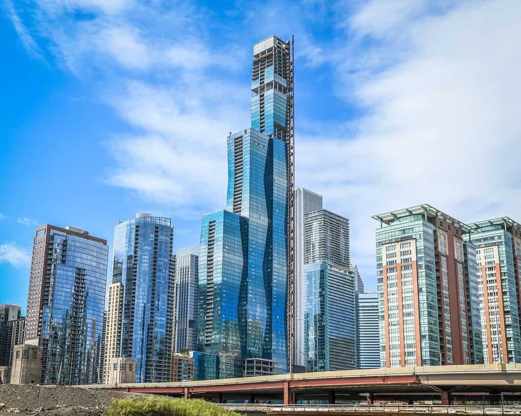 A new supertall luxury residential tower rises in Chicago, IL.