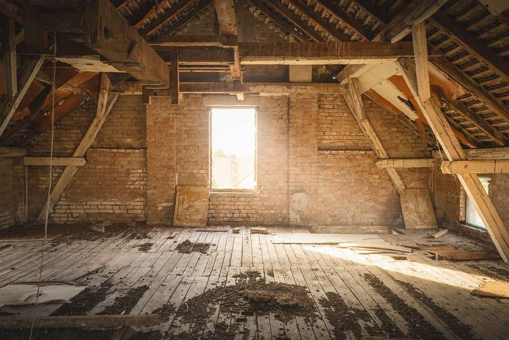 Old Rustic Attic with Sunlight coming through Window.