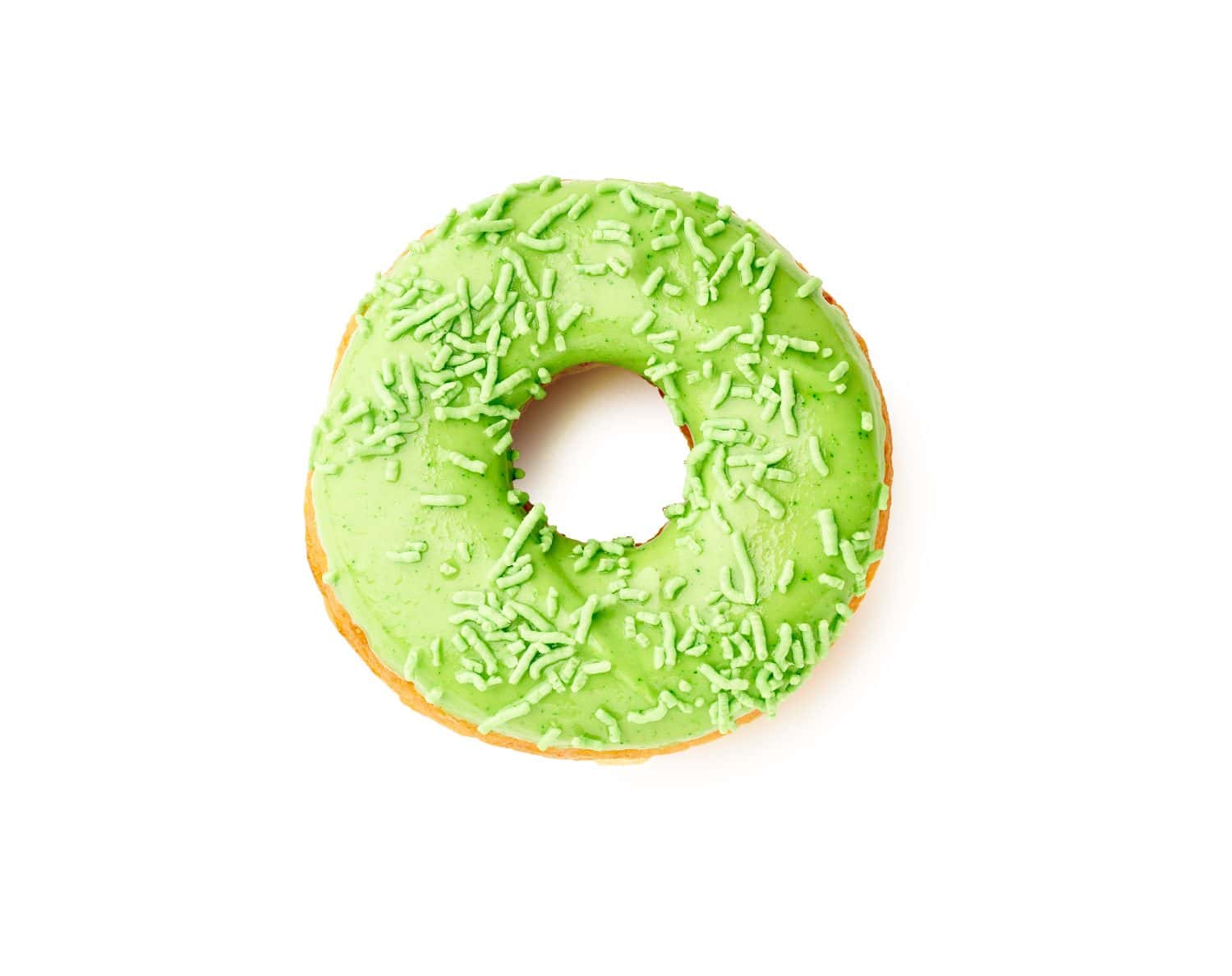 Glazed sweet green apple donut isolated on white background with copy space.