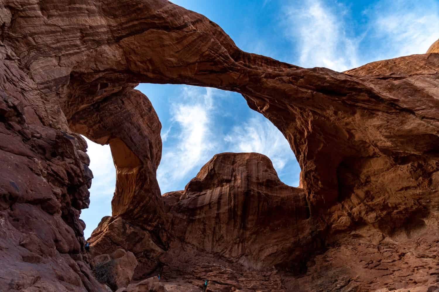 Arches National Park at Midday - Arches has many arches including the famous Delicate Arch, the Window Arch, the Double Arch and other features such as Tower of Babel, Turret Arch, and the Courthouse 