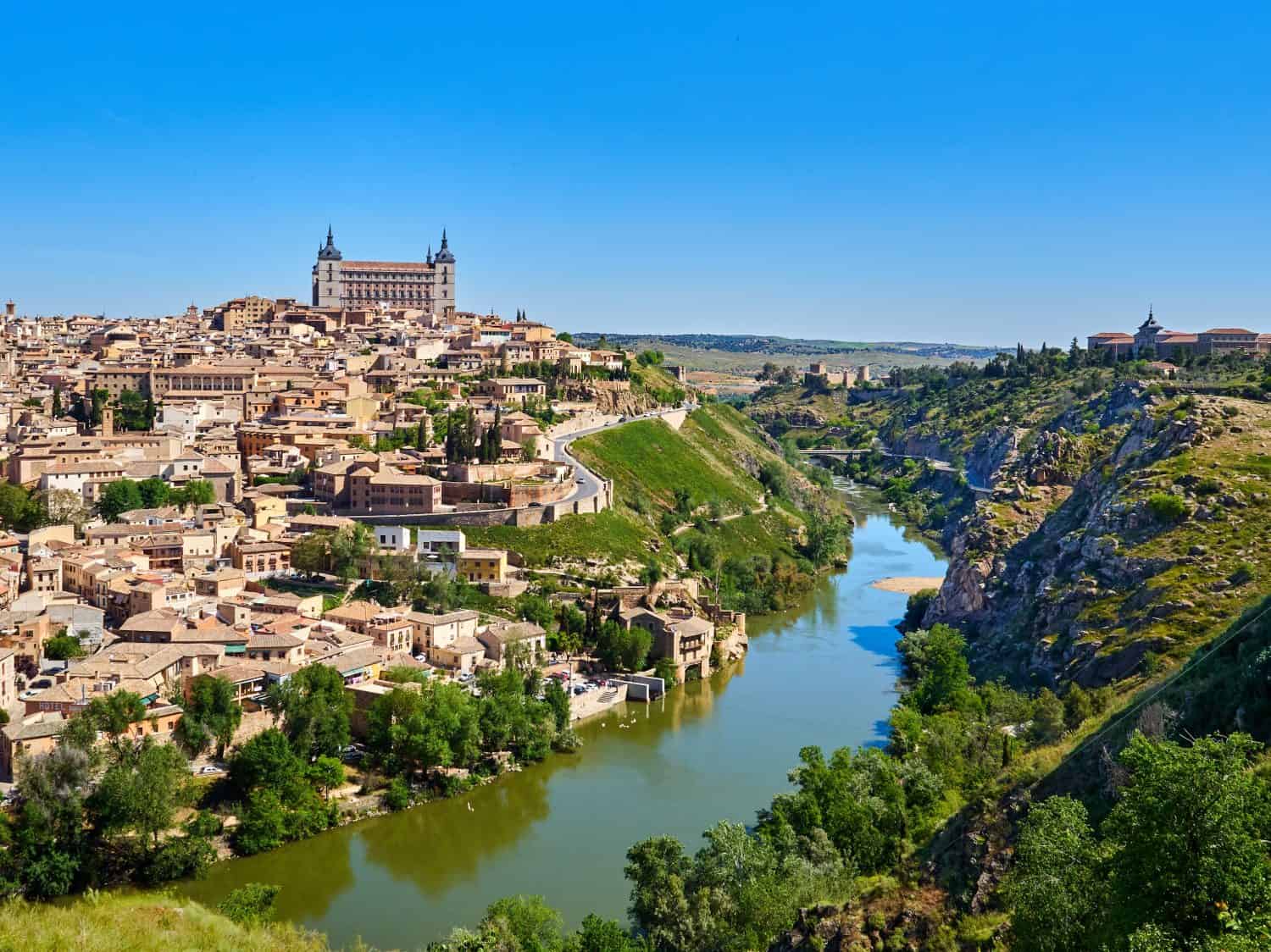 Panoramic view of Toledo with Tagus river and the Alcazar seen from the viewpoint Mirador del Valle. Castilla La Mancha, Spain, Europe