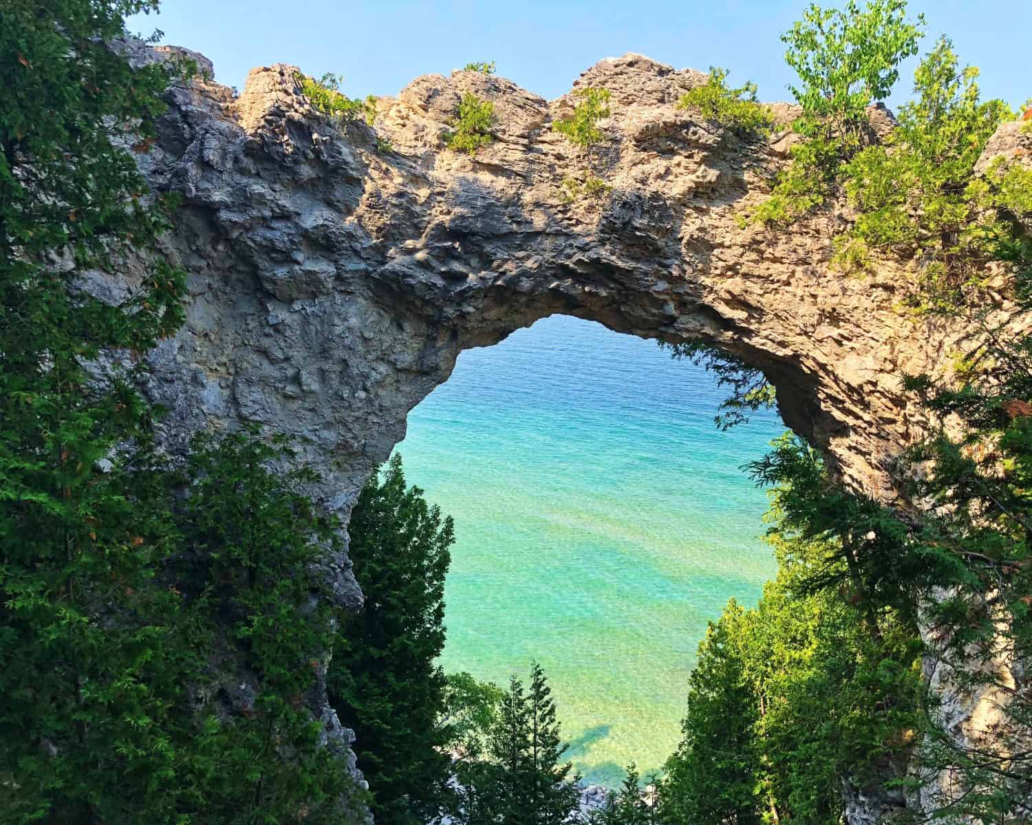 "Millennium's Arch" - Arch Rock in Mackinac Island State Park is a natural limestone formation. Taken in the beginning of summer, this declares a scenic view of Lake Huron through the Arch.