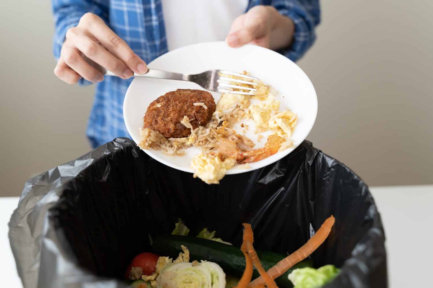 people put bio trash from food waste in domestic homes to compost bins to make fertilizer to reduce global environmental pollution.