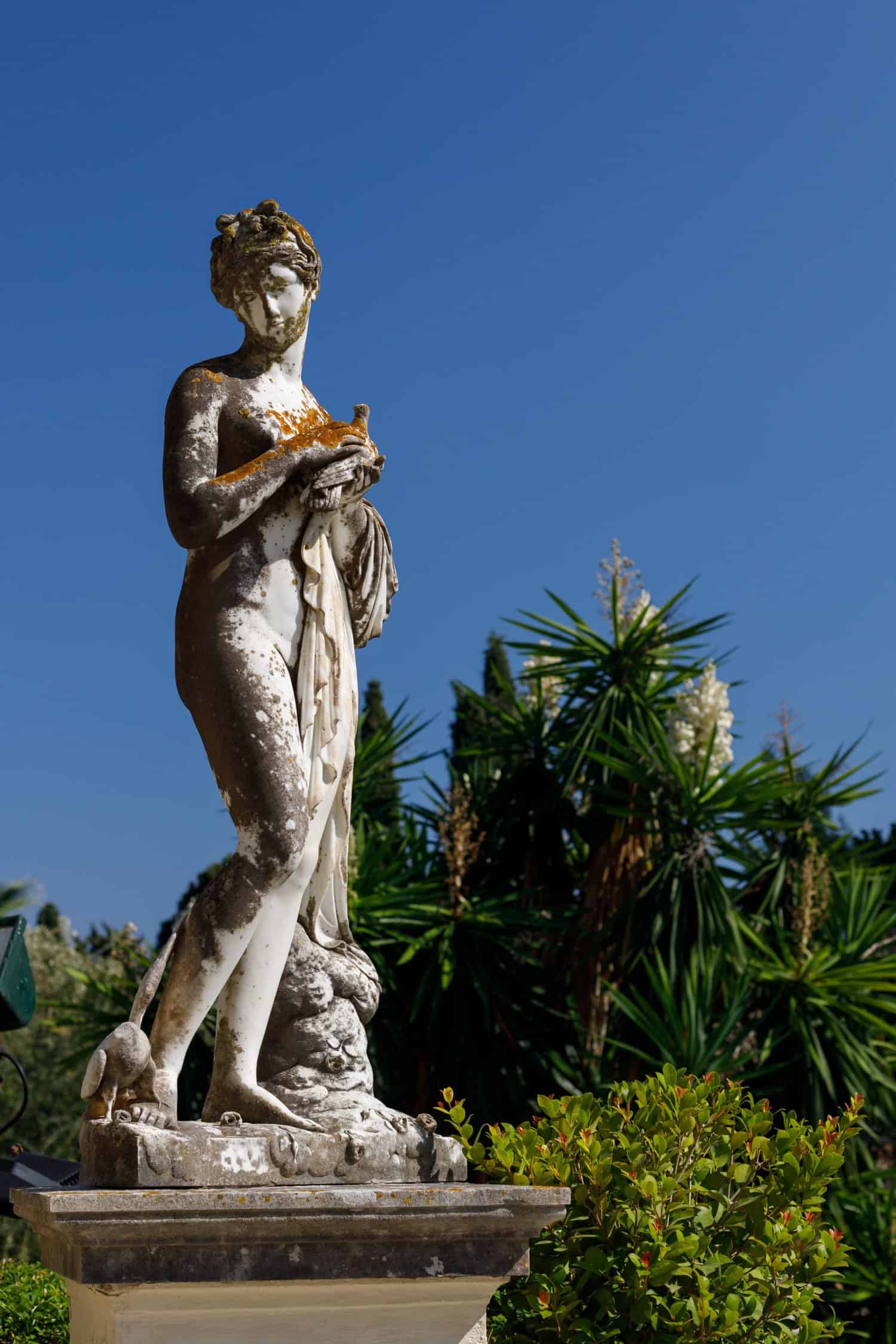 The Palace of the Empress Elisabeth Sissi of Austria, known as the Achilleion Palace, is home to a striking statue of Aphrodite holding a dove. Corfu, Greece