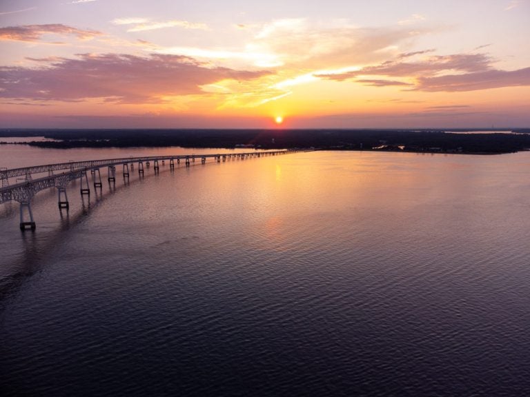 A sunset aerial drone photo of the Chesapeake Bay Bridge in Annapolis Maryland. It is also referred to as the William Preston Lane Jr. Memorial Bay Bridge.