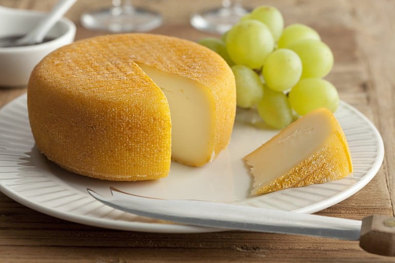 Port salut cheese and grapes for dessert