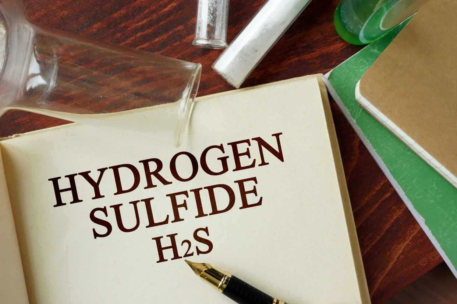 Words hydrogen sulfide written on a page. Chemistry concept.