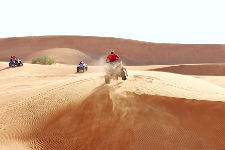 ATV jump on a sand dune
