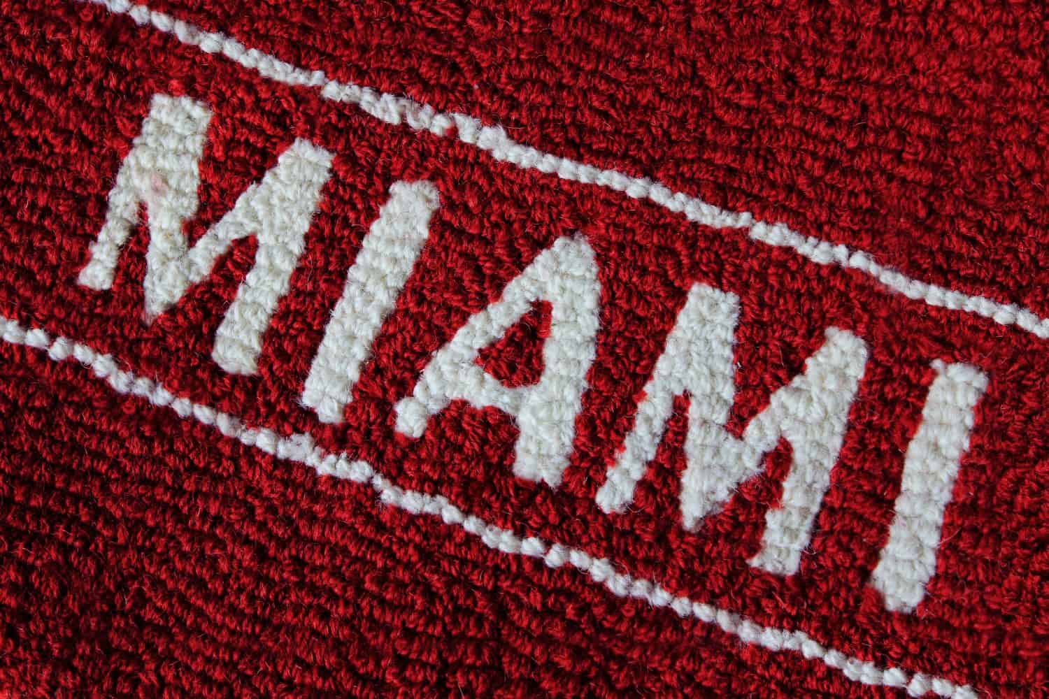 Vintage Red Miami University Oxford Ohio Embroidered on Seat Cover Texture Background