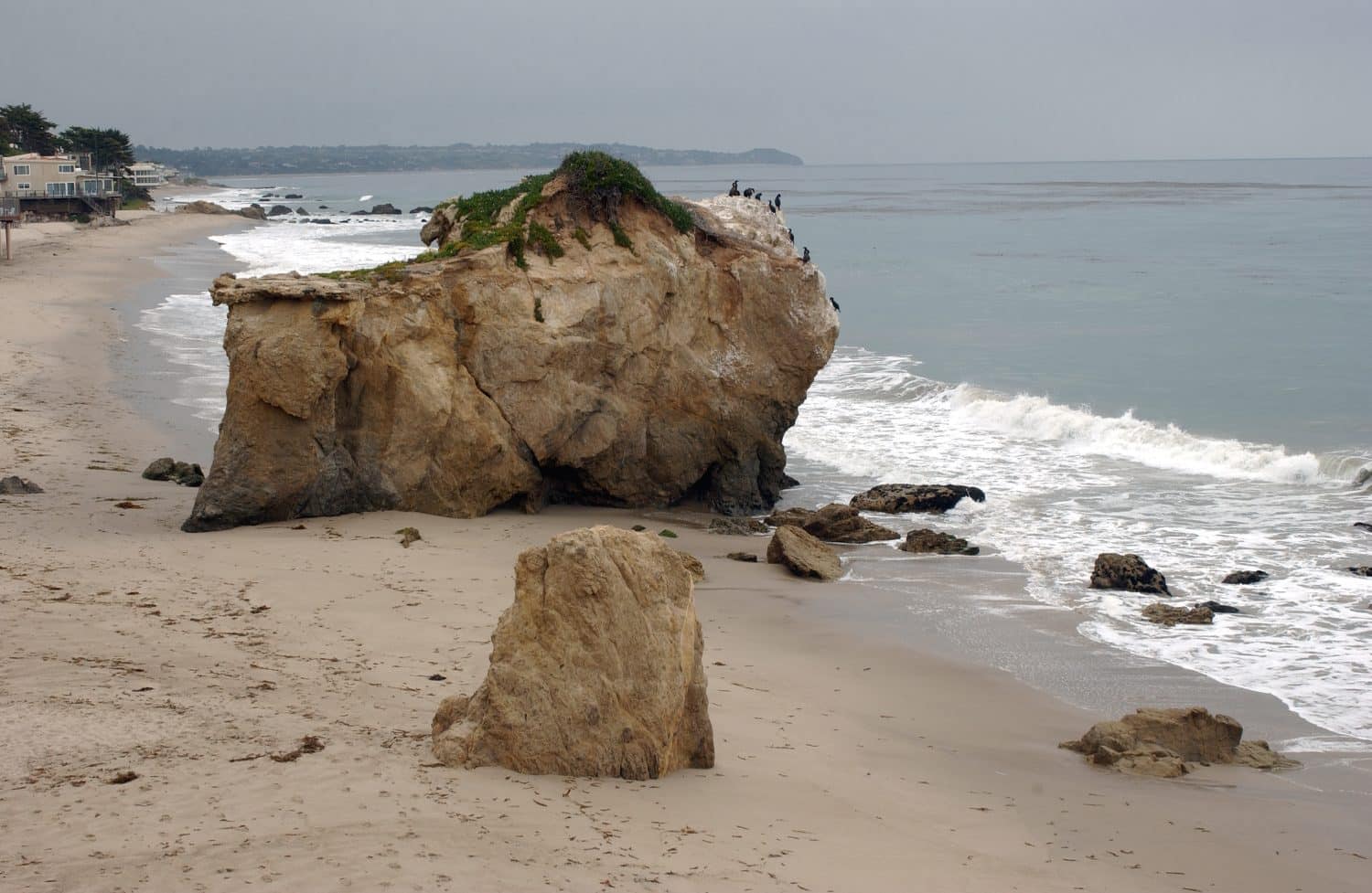  Rocks along Leo Carillo Beach in southern California with waves crashing along the beach