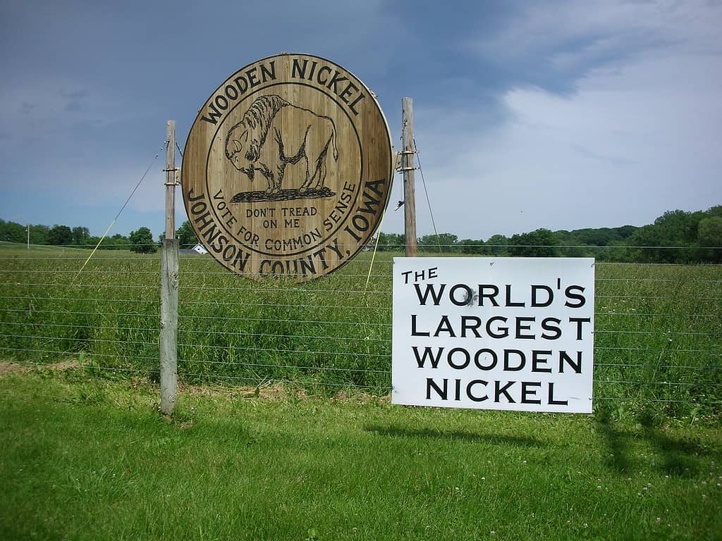 world's largest wooden nickel in cornfield