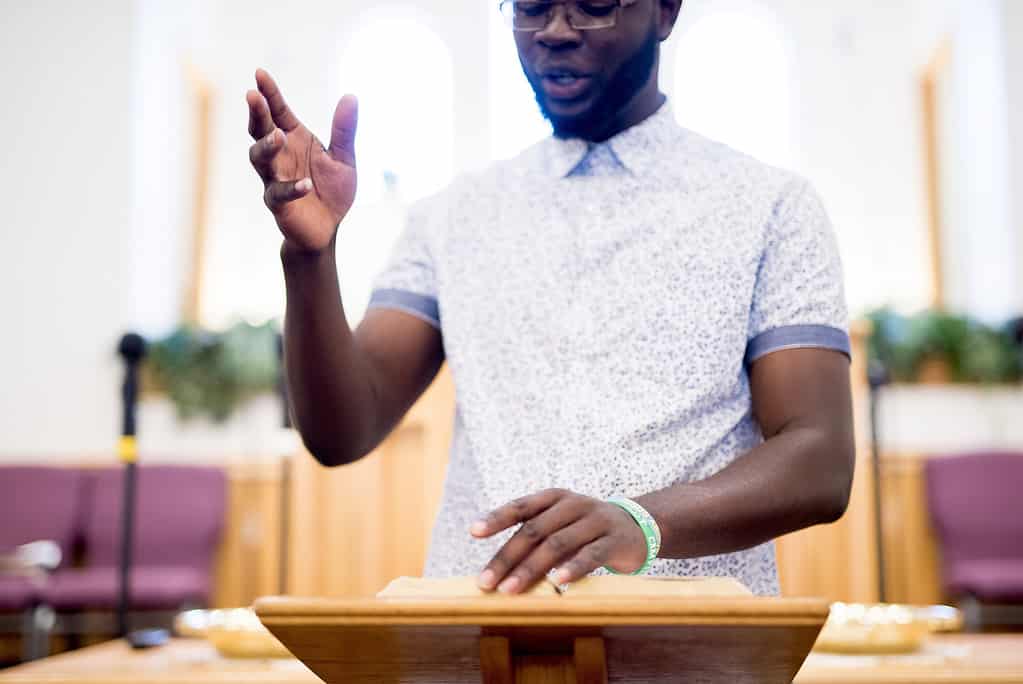 Male reading the bible in the church
