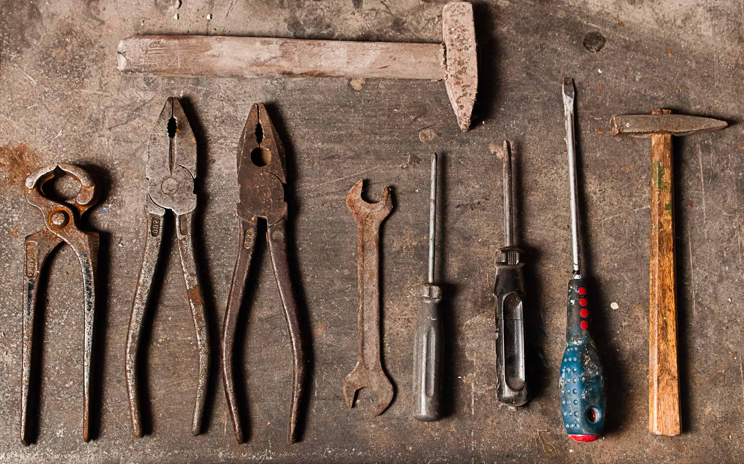 Workbench with rusty tools
