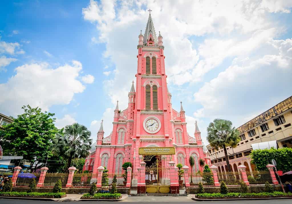 Tan Dinh Church Saigon is a pink, Romanian-style, second largest church in Ho Chi Minh City, Vietnam, where you can see intricate Gothic and Renaissance elements surviving Vietnam’s turbulent periods.