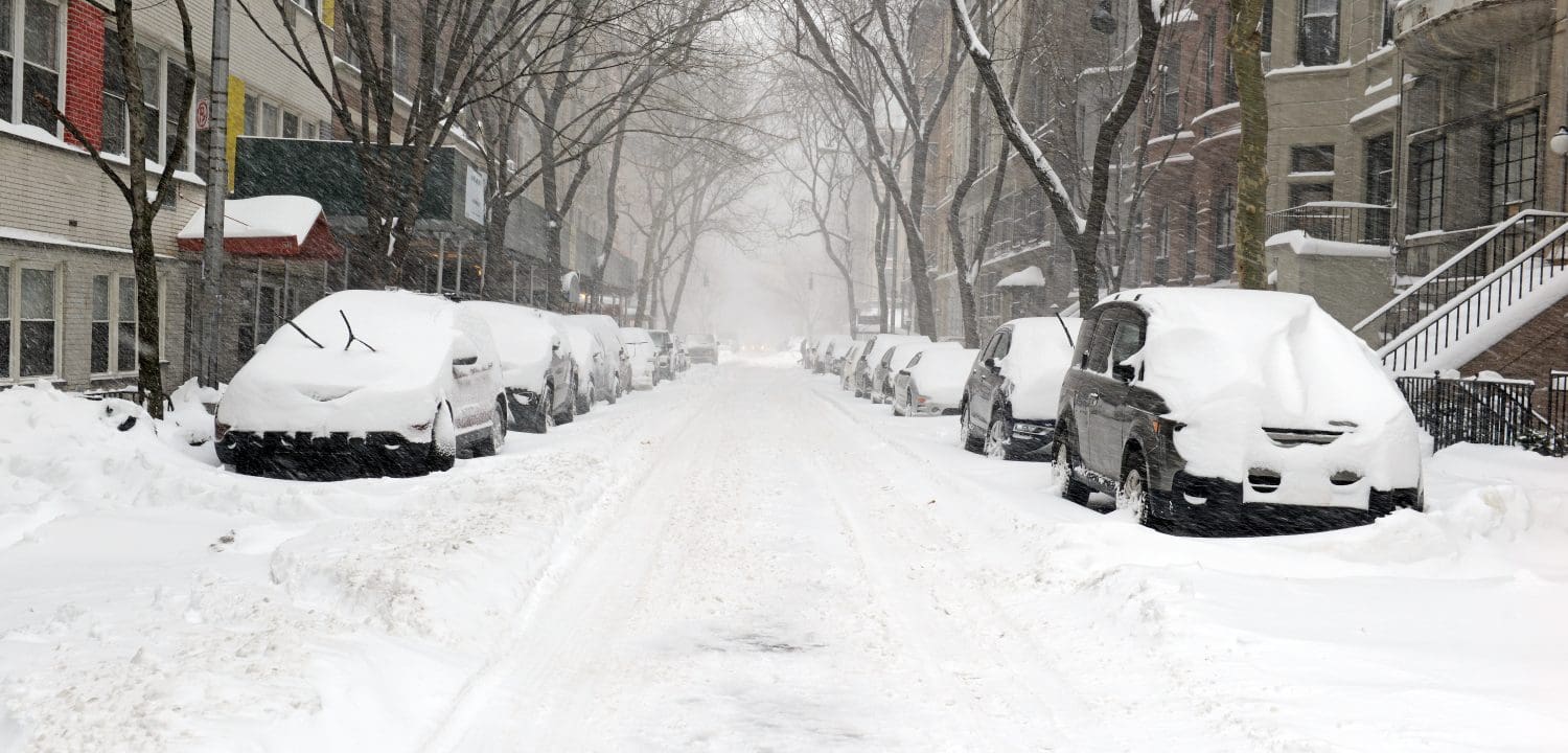 City street covered in snow in Manhattan New York during Noreaster snowstorm