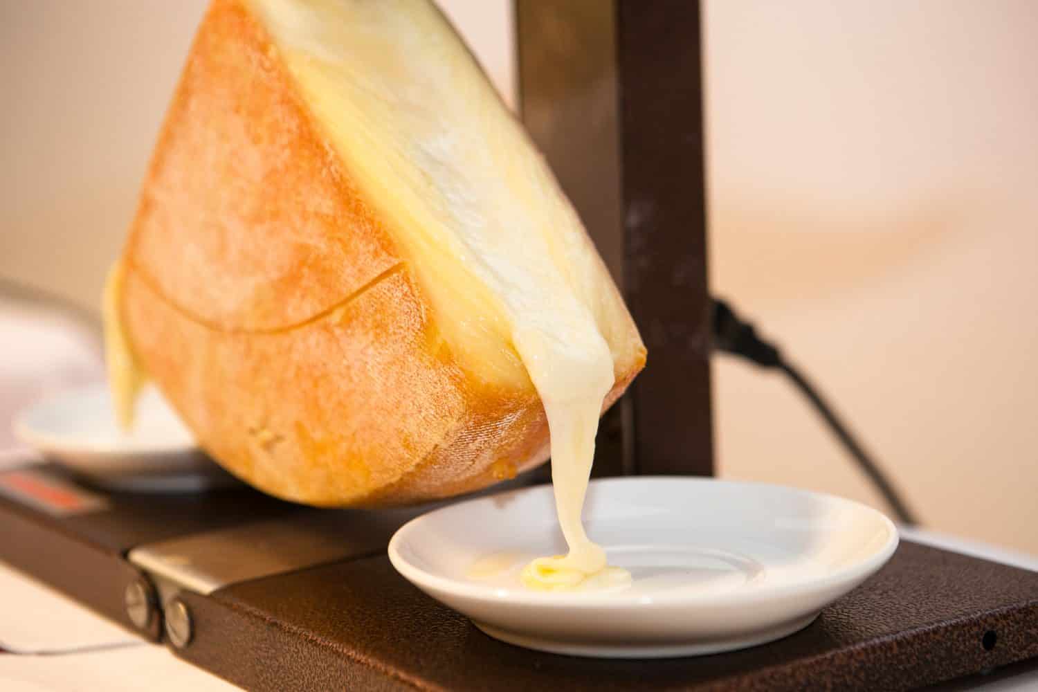 hot Raclette cheese in wintertime