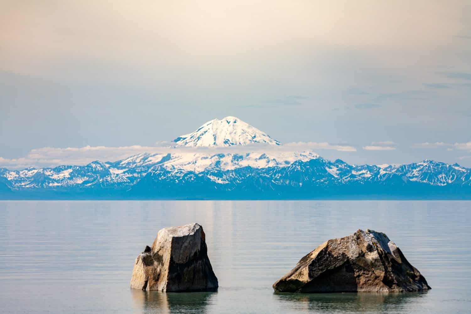 Active Volcano Mt Redoubt seen from across the Cook Inlet at Clam Gulch, Alaska 