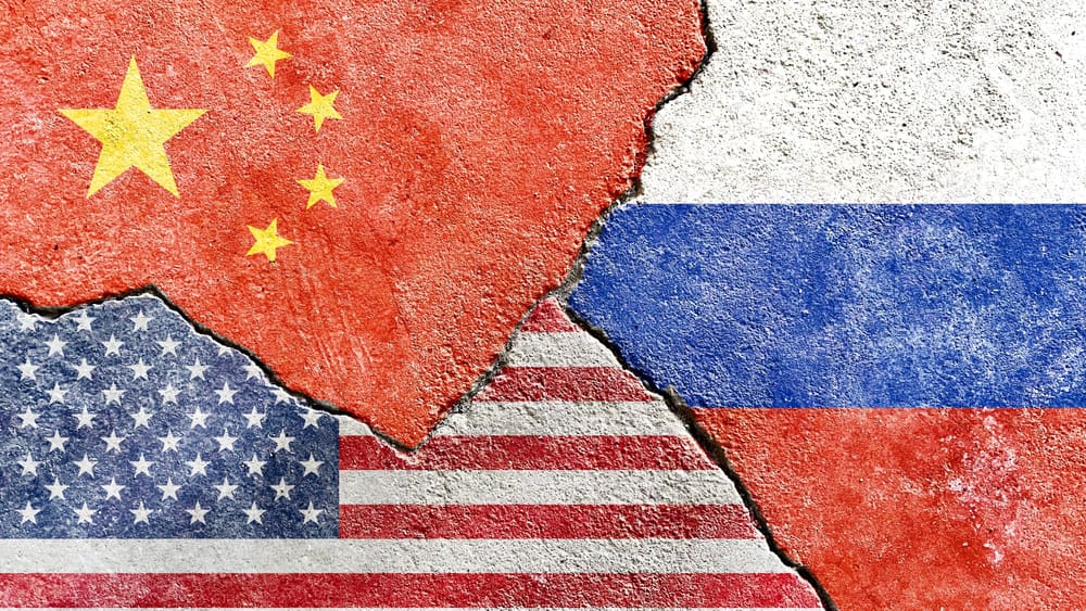 China VS US (United States) VS Russia national flags on broken wall with cracks background, abstract China USA Russia international politics relationship conflicts concept