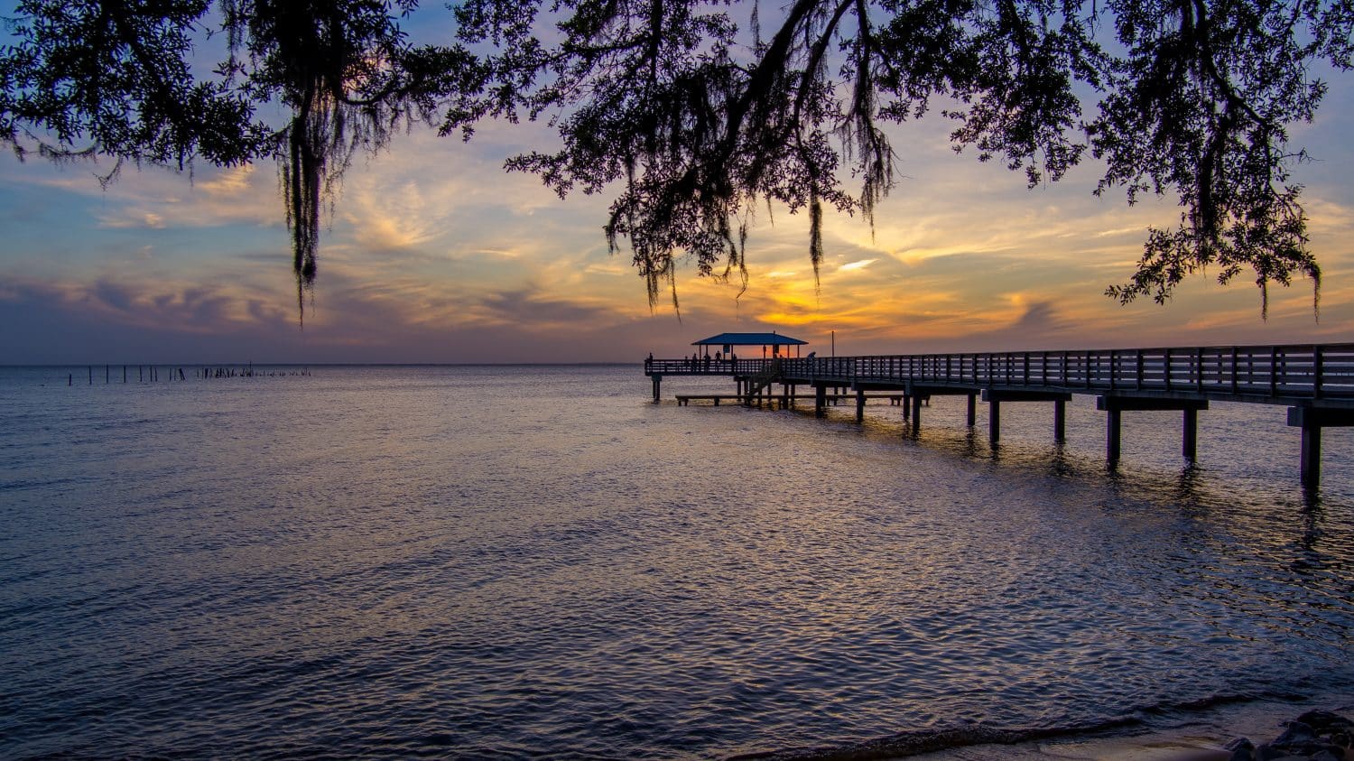 Pier on Mobile Bay at sunset from Mayday Park in Daphne, Alabama 