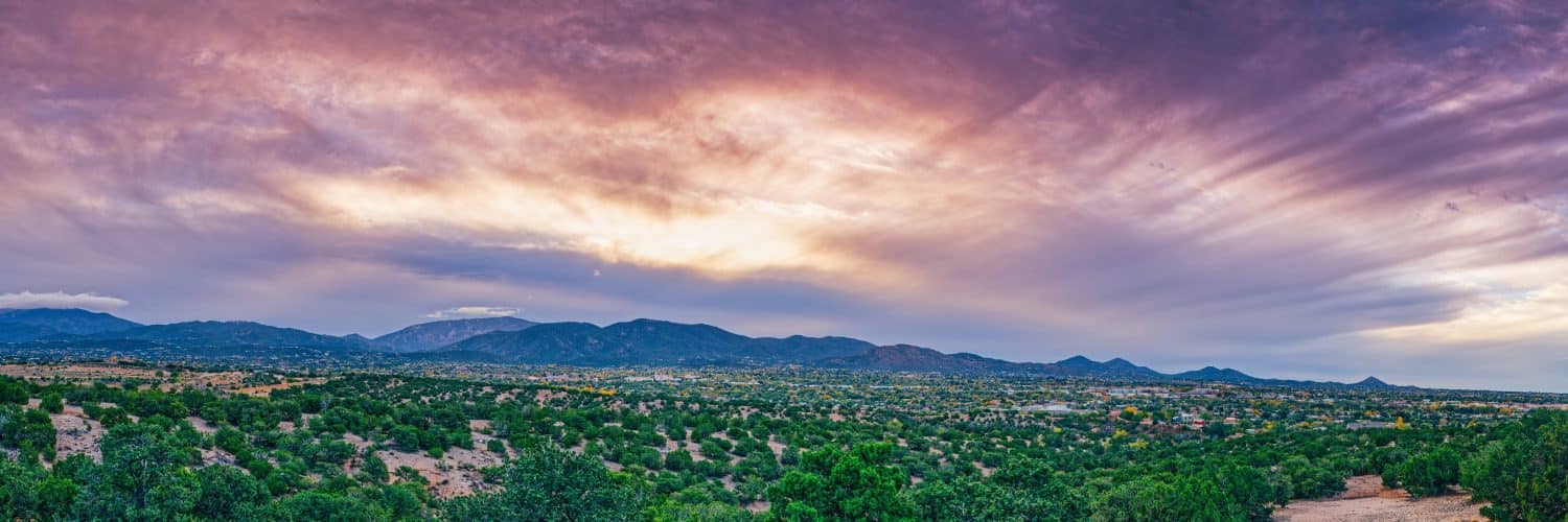 Sun Breaking through the Clouds Over Sangre de Cristo Mountains and Santa Fe New Mexico 