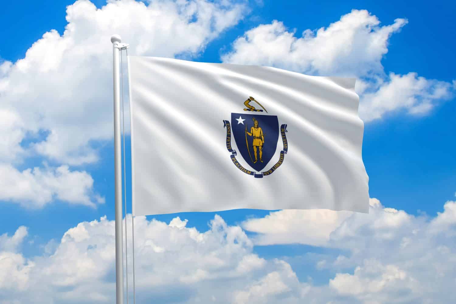 Massachusetts flag waving in the wind on clouds sky. High quality fabric. International relations concept