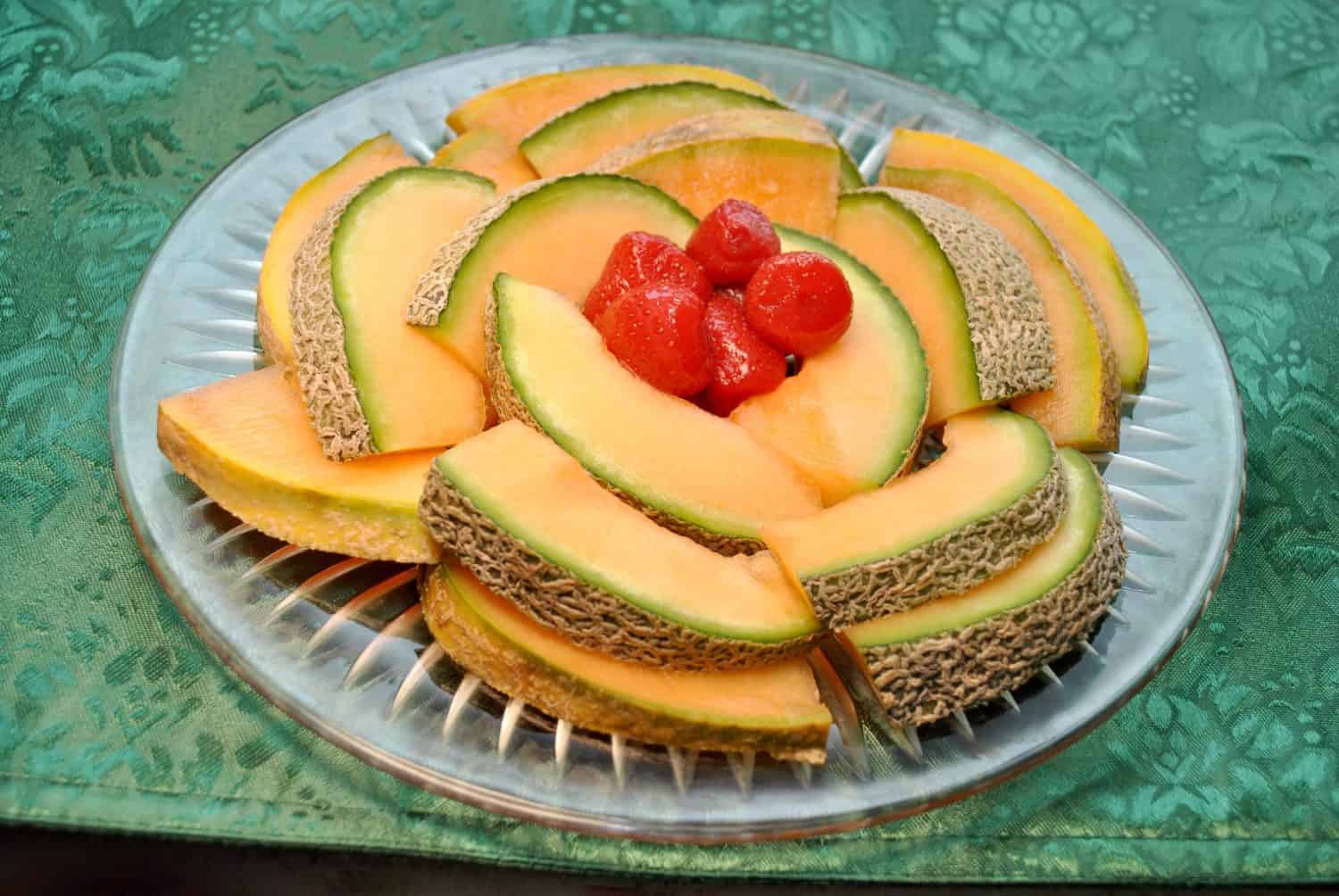 Breakfast Cantaloupe with Fresh Strawberries on a Glass Platter
