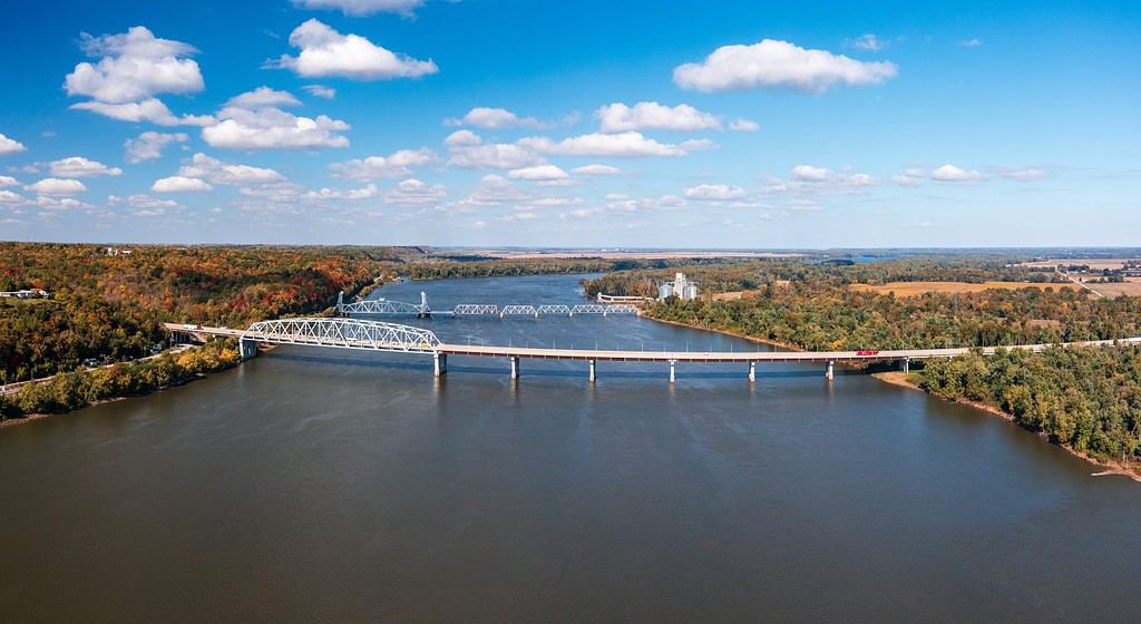 Aerial view of the Mark Twain Memorial highway river bridge and Wabasha railroad bridge between Hannibal Missouri and Illinois