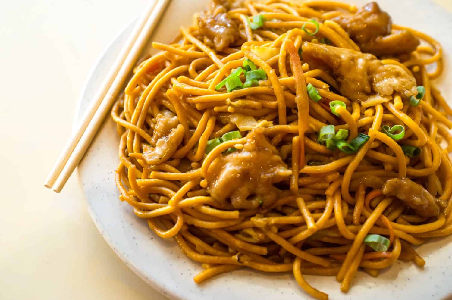 Chinese food tasty chicken lo mein noodles at restaurant