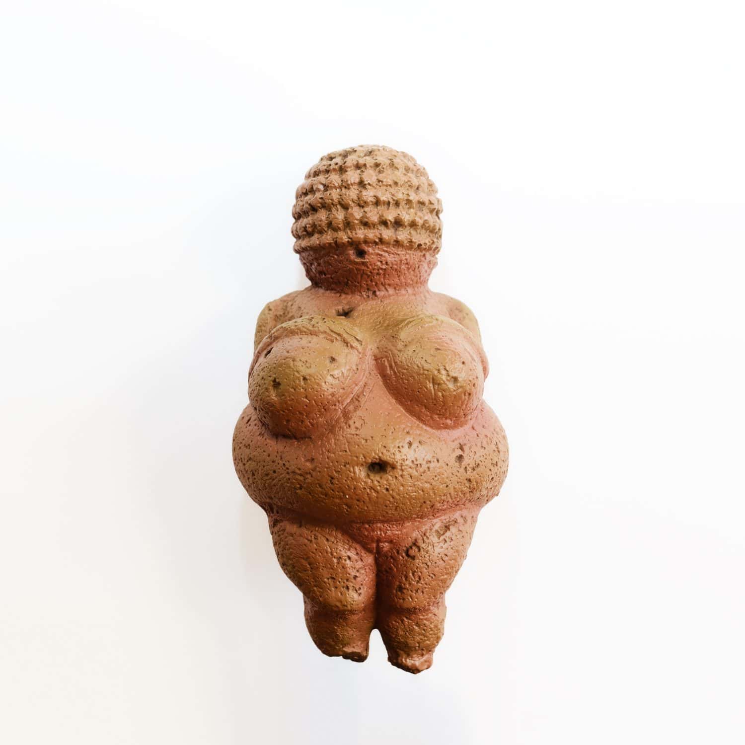 Venus of Willendorf statuette, exact copy of the original. Ancient motherhood and fertility symbol.