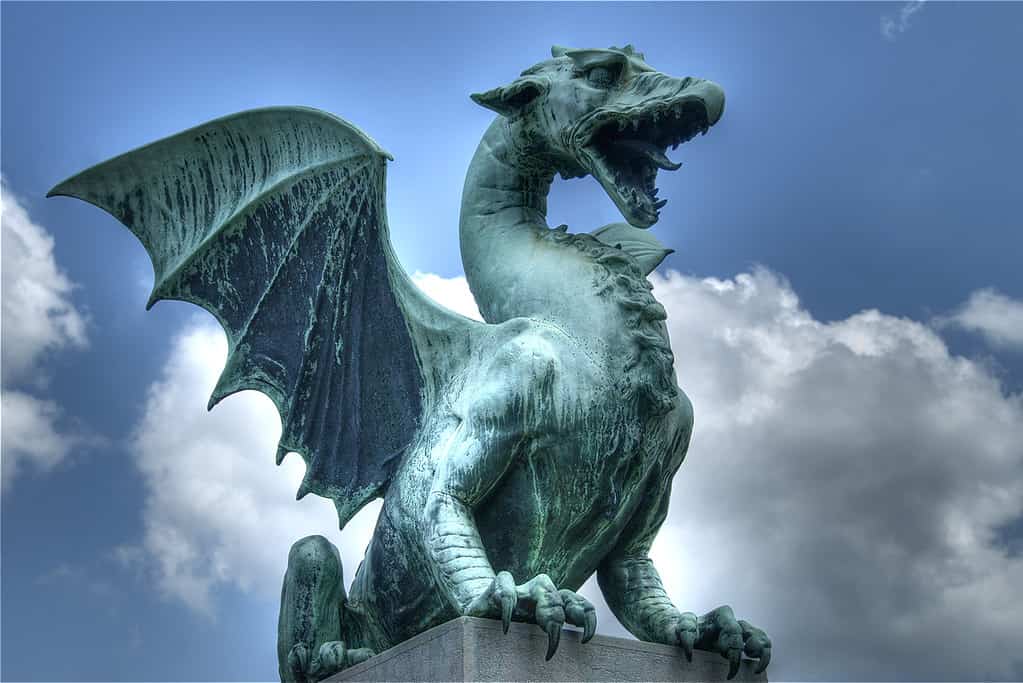 Statue of a dragon guarding one of the beautiful bridges in downtown Ljubljana, Slovenia.