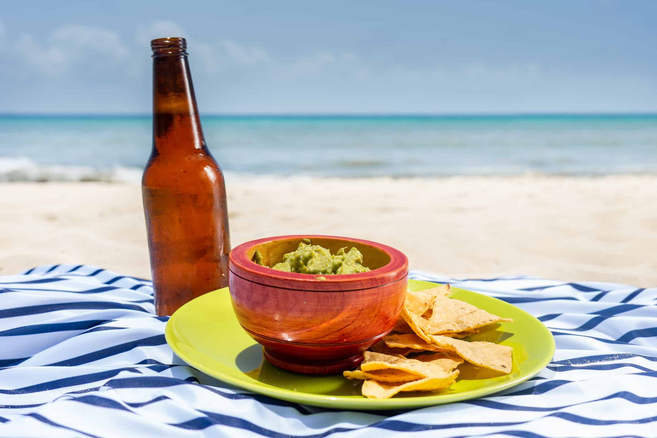 Guacamole and beer at the beach