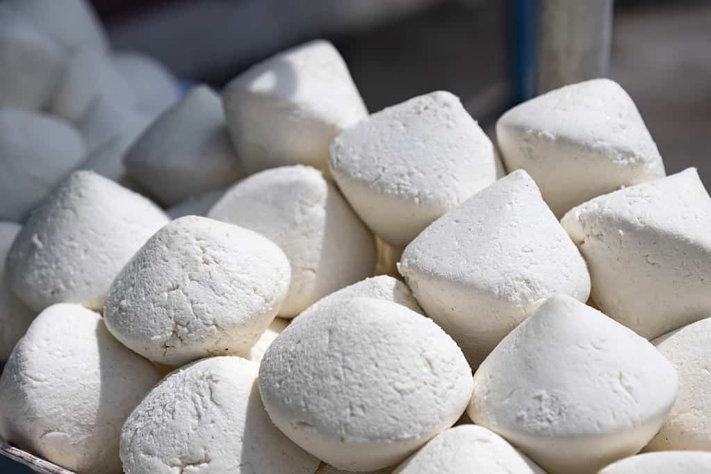 White piecies of national food kurt in the Kyrgyz market