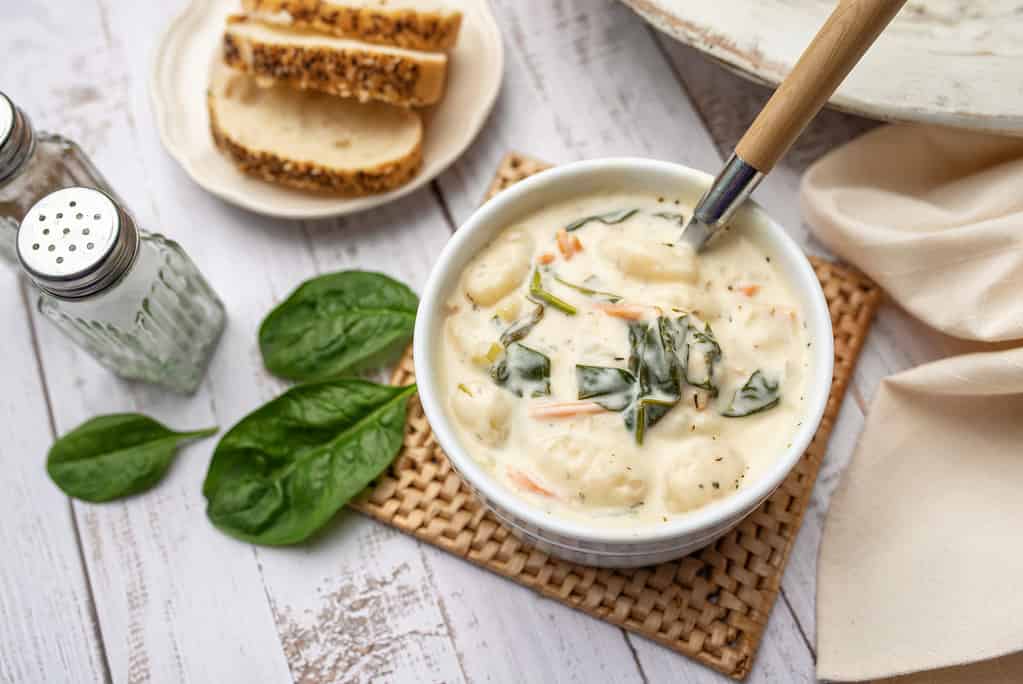Homemade Italian cream soup with potato gnocchi